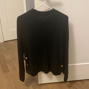 Black sweater with gold buttons